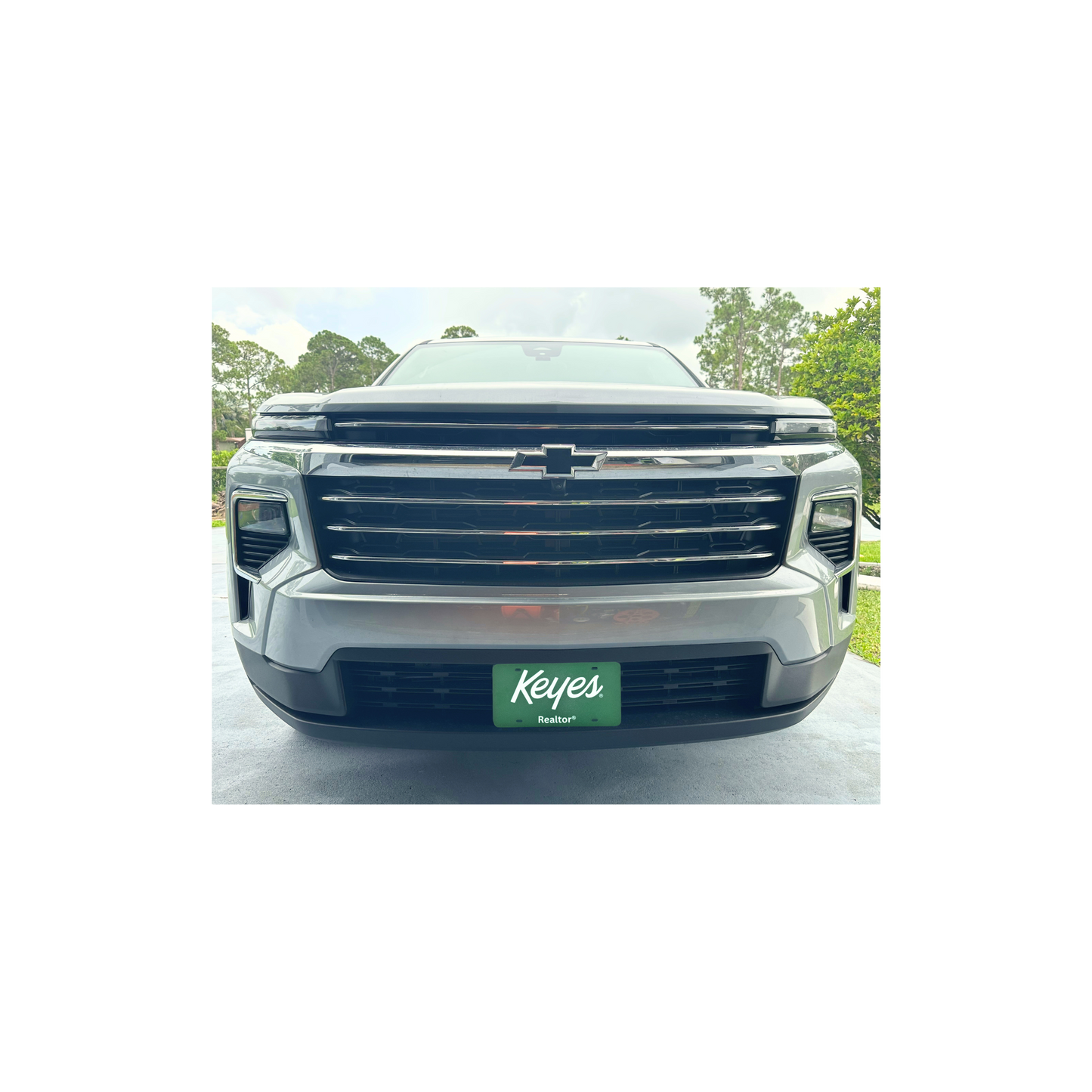 Front License Plate - The Keyes Co. (Realtor®) White Text